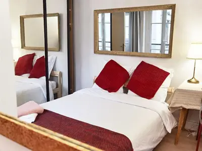 Un ou plusieurs lits dans un hébergement de l'établissement Chic Studio 30ms to Le Bon Marche N6-71