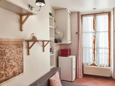 Un ou plusieurs lits dans un hébergement de l'établissement Charming Studio in the Heart of the Latin Quarter N5-3