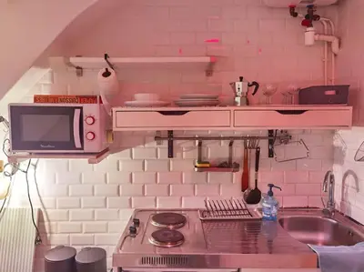 Cuisine ou kitchenette dans l'établissement Top roof view studio with elevator 1mn St Germain