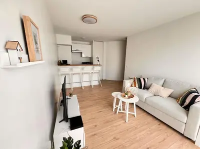 Cuisine ou kitchenette dans l'établissement T2 Paris - Stade de France Parking Gratuit, RER