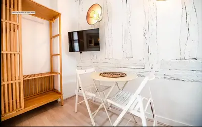 Télévision ou salle de divertissement dans l'établissement Appartement pour 2 personnes