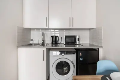 Cuisine ou kitchenette dans l'établissement Studio en plein Coeur du Marais