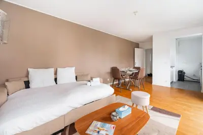 Coin salon dans l'établissement Appartement Fonctionnel Immeuble Neuf