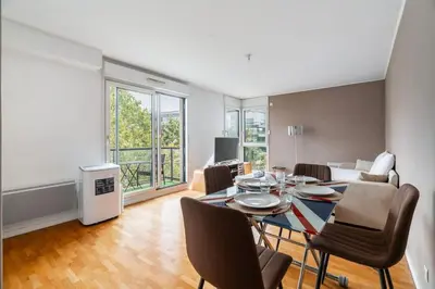 Coin salon dans l'établissement Appartement Fonctionnel Immeuble Neuf