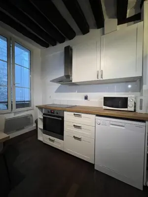 Cuisine ou kitchenette dans l'établissement Appartement Saint-Germain-Des-Prés