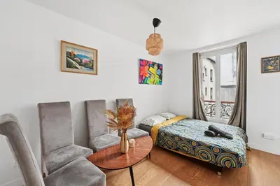 Coin salon dans l'établissement 5 persons apartment Montparnasse