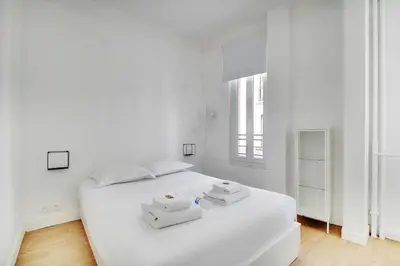 Un ou plusieurs lits dans un hébergement de l'établissement Comfortable flat near Paris - Suresnes