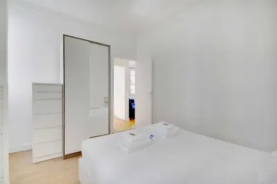 Un ou plusieurs lits dans un hébergement de l'établissement Comfortable flat near Paris - Suresnes