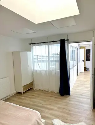 Un ou plusieurs lits dans un hébergement de l'établissement Parisian Spacious 70m2 Flat Near Eiffel Tower