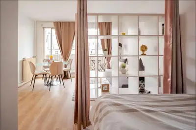 Un ou plusieurs lits dans un hébergement de l'établissement Hermoso apartamento a 10 minutos De la Torre Eiffel