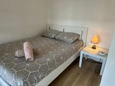 Un ou plusieurs lits dans un hébergement de l'établissement Hermoso apartamento a 10 minutos De la Torre Eiffel