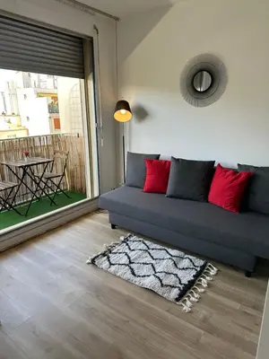 Coin salon dans l'établissement Hermoso apartamento a 10 minutos De la Torre Eiffel