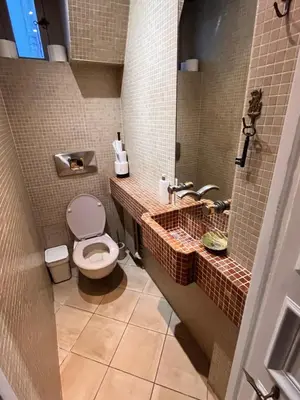 Salle de bains dans l'établissement Vivre au Village des Batignolles