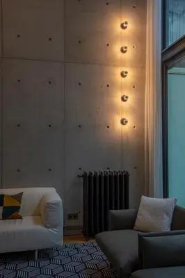 Un ou plusieurs lits dans un hébergement de l'établissement Parisian loft with plenty of light and solarium in Bastille area