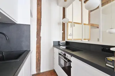 Cuisine ou kitchenette dans l'établissement Appartement Quartier Panthéon 2 Free Netflix