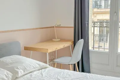 Un ou plusieurs lits dans un hébergement de l'établissement Flexliving - room - Septembre
