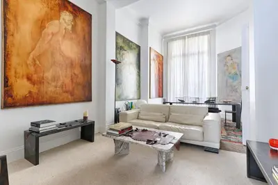 Coin salon dans l'établissement Apt Dupleix Luxueux Cœur du 16ème 8P 4BR