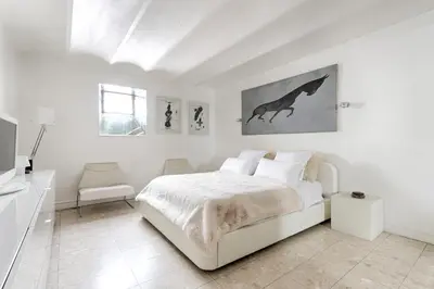 Un ou plusieurs lits dans un hébergement de l'établissement Apt Dupleix Luxueux Cœur du 16ème 8P 4BR