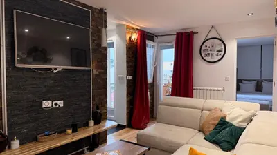 Télévision ou salle de divertissement dans l'établissement Appartement convivial pour séjourner