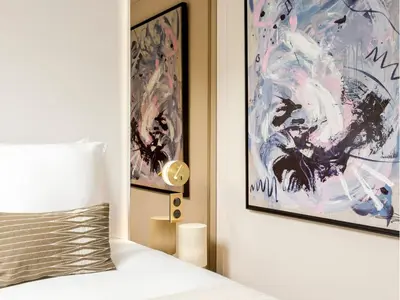Un ou plusieurs lits dans un hébergement de l'établissement Merveil - Luxury Suite - Champs Elysees - St Cyr I