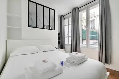 Un ou plusieurs lits dans un hébergement de l'établissement Charming apartment -1BR-4P- Gare Montparnasse