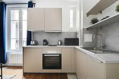 Cuisine ou kitchenette dans l'établissement Charming apartment -1BR-4P- Gare Montparnasse