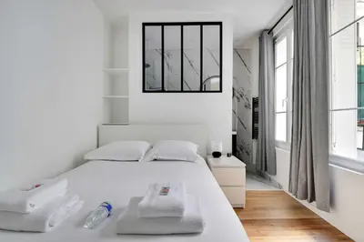 Un ou plusieurs lits dans un hébergement de l'établissement Charming apartment -1BR-4P- Gare Montparnasse