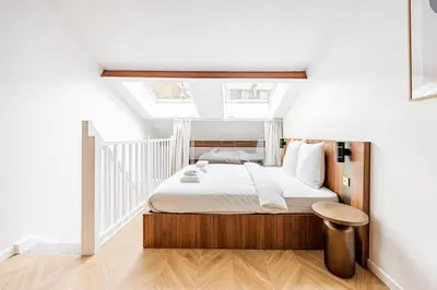 Un ou plusieurs lits dans un hébergement de l'établissement 155#Suite luxueuse#Etienne Marcel#Châtelet#Paris 3