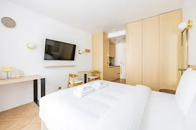 Un ou plusieurs lits dans un hébergement de l'établissement 154 Suite luxueuse-Etienne Marcel-Châtelet-Paris 3