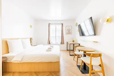 Un ou plusieurs lits dans un hébergement de l'établissement 154 Suite luxueuse-Etienne Marcel-Châtelet-Paris 3