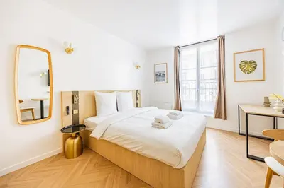 Un ou plusieurs lits dans un hébergement de l'établissement 153 Suite luxueuse-Etienne Marcel-Châtelet-Paris 3