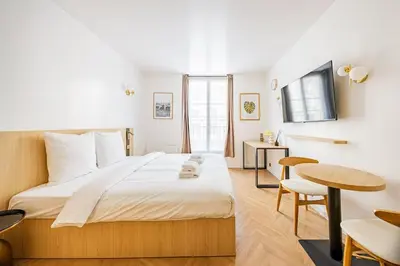 Un ou plusieurs lits dans un hébergement de l'établissement 153 Suite luxueuse-Etienne Marcel-Châtelet-Paris 3