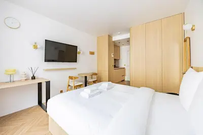 Un ou plusieurs lits dans un hébergement de l'établissement 153 Suite luxueuse-Etienne Marcel-Châtelet-Paris 3