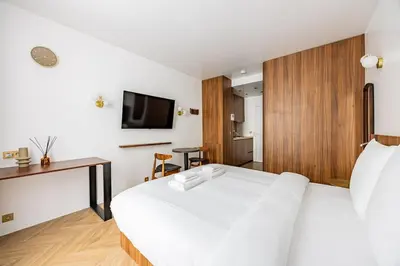 Un ou plusieurs lits dans un hébergement de l'établissement 152 Suite luxueuse-Etienne Marcel-Châtelet-Paris 3