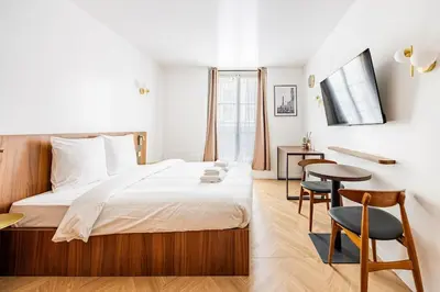 Un ou plusieurs lits dans un hébergement de l'établissement 152 Suite luxueuse-Etienne Marcel-Châtelet-Paris 3
