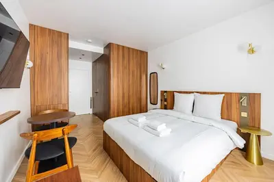 Un ou plusieurs lits dans un hébergement de l'établissement 152 Suite luxueuse-Etienne Marcel-Châtelet-Paris 3