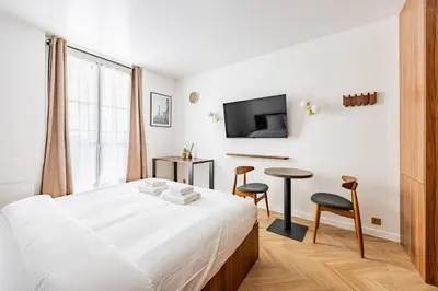 Un ou plusieurs lits dans un hébergement de l'établissement 152 Suite luxueuse-Etienne Marcel-Châtelet-Paris 3