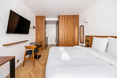 Un ou plusieurs lits dans un hébergement de l'établissement 152 Suite luxueuse-Etienne Marcel-Châtelet-Paris 3