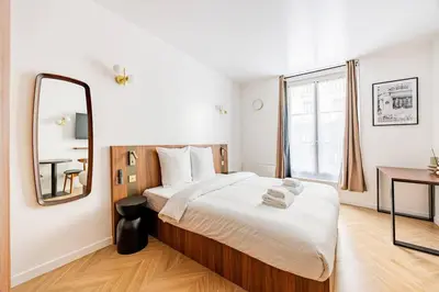 Un ou plusieurs lits dans un hébergement de l'établissement 151 Suite luxueuse-Etienne Marcel-Châtelet-Paris 3