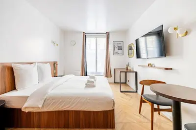 Un ou plusieurs lits dans un hébergement de l'établissement 151 Suite luxueuse-Etienne Marcel-Châtelet-Paris 3
