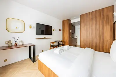 Un ou plusieurs lits dans un hébergement de l'établissement 151 Suite luxueuse-Etienne Marcel-Châtelet-Paris 3