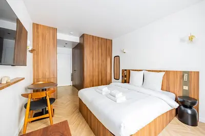 Un ou plusieurs lits dans un hébergement de l'établissement 151 Suite luxueuse-Etienne Marcel-Châtelet-Paris 3