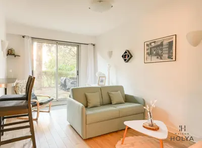 Coin salon dans l'établissement Proche de Paris - La Populaire - 5MB
