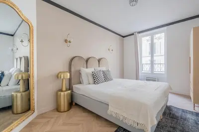 Un ou plusieurs lits dans un hébergement de l'établissement Appartement au cœur du 11ème Quartier Oberkampf