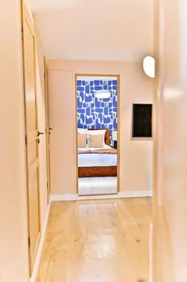 Télévision ou salle de divertissement dans l'établissement Appartement 3 chambres Paris 2ème - III