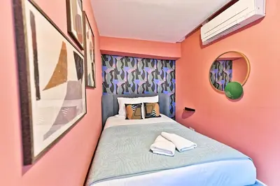 Un ou plusieurs lits dans un hébergement de l'établissement Appartement 3 chambres Paris 2ème - III