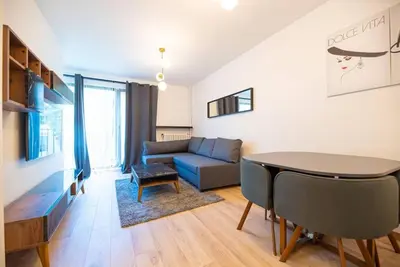 Télévision ou salle de divertissement dans l'établissement Appartement confortable et moderne - centre
