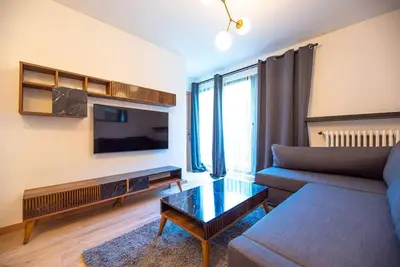 Télévision ou salle de divertissement dans l'établissement Appartement confortable et moderne - centre
