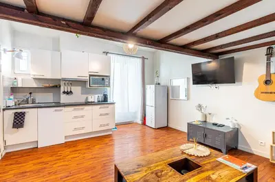 Cuisine ou kitchenette dans l'établissement GuestReady - Havre de paix près de Montmartre
