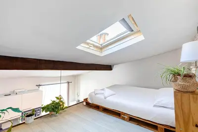 Un ou plusieurs lits dans un hébergement de l'établissement GuestReady - Havre de paix près de Montmartre